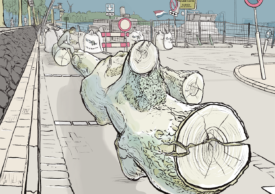 Frank Stoks. De weg en parkeerplaatsen bij Tropicana zijn versperd met zandzakken en boomstammen.